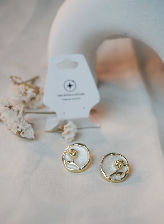 WHITE AND GOLD STUDS